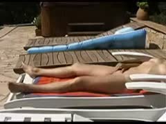 On the beach, Hiden Cam Milf is masturbating.